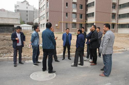 銅煤公司承建的銅煤2#小區(qū)水仙居5、6、7、8#樓順利通過竣工驗收