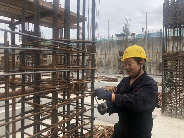 按下快門，定格建設(shè)施工一線最美身影