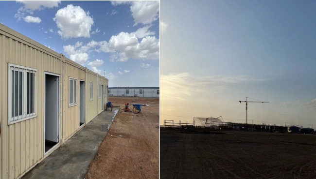 萬(wàn)頃黃沙映壯志，樓閣巍巍矗風(fēng)沙